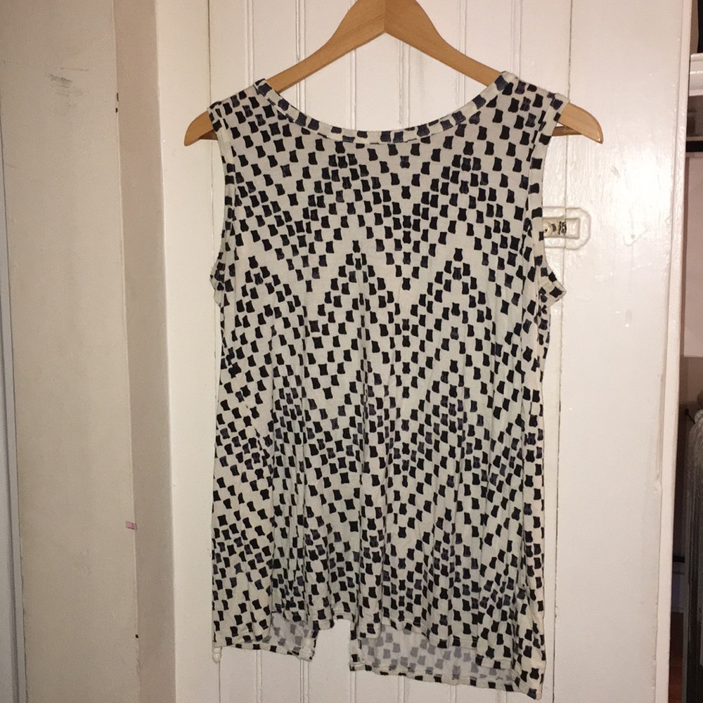 Sleeveless split back top.